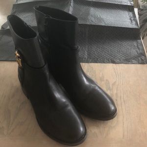 Tory Burch black booties with insignia on both